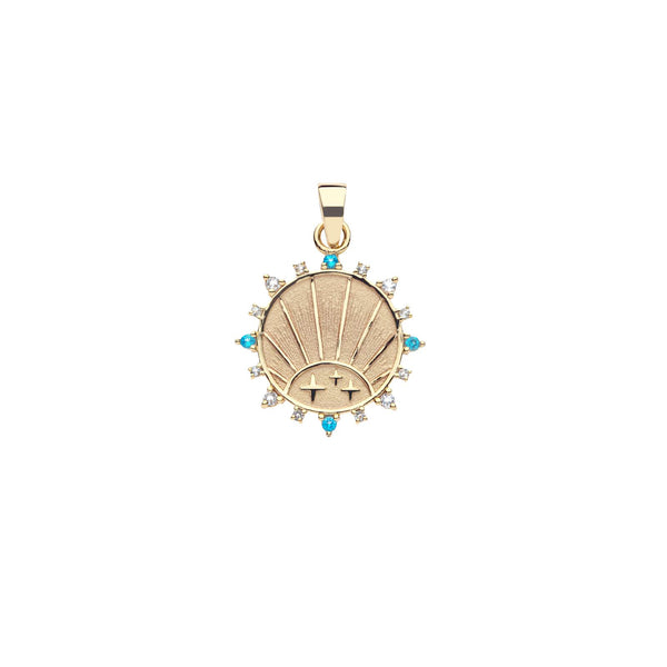 Gold pendant with gemstones on a white background
