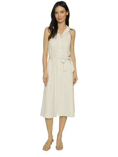 Woman wearing a white sleeveless dress on a white background