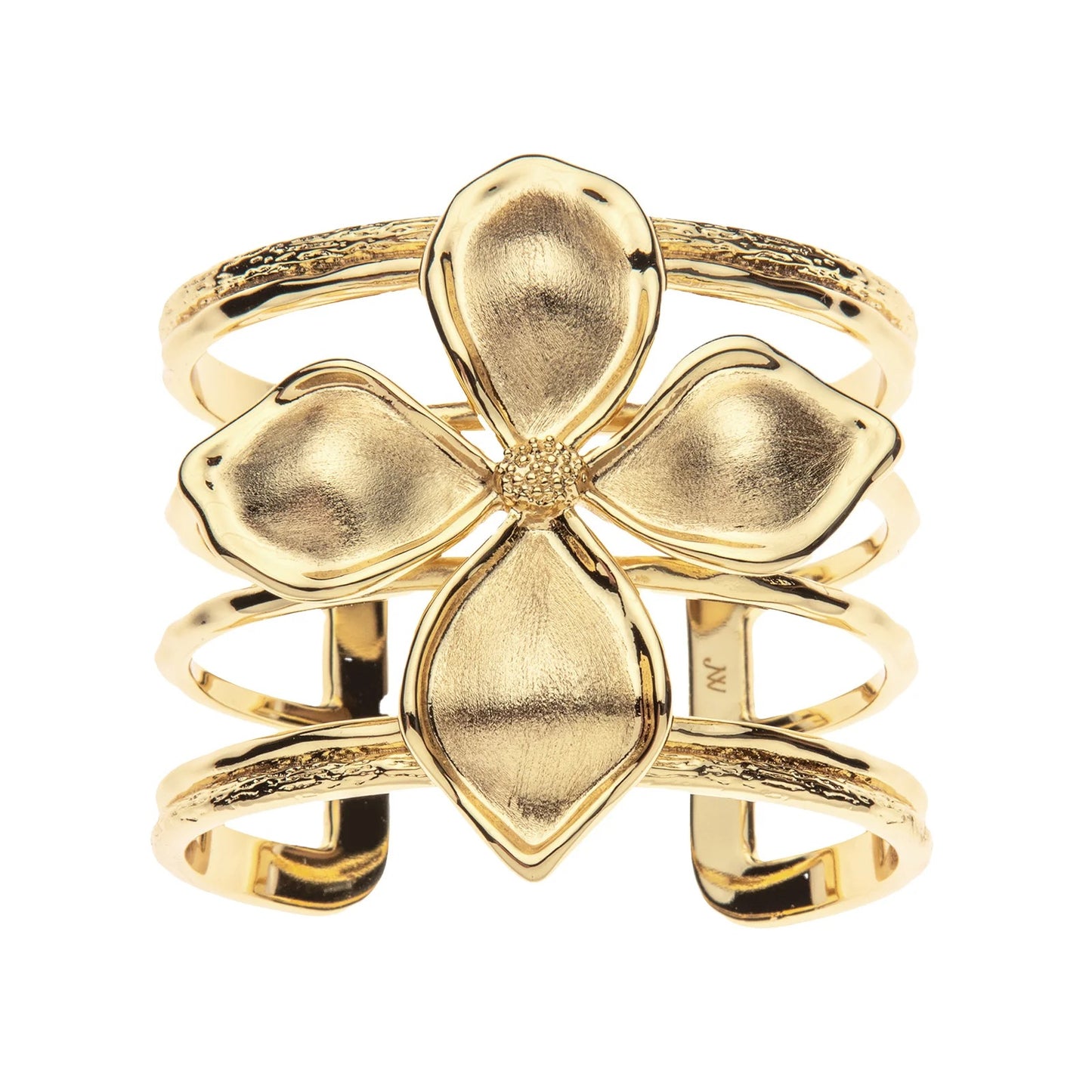 Gold four-leaf clover ring on a white background
