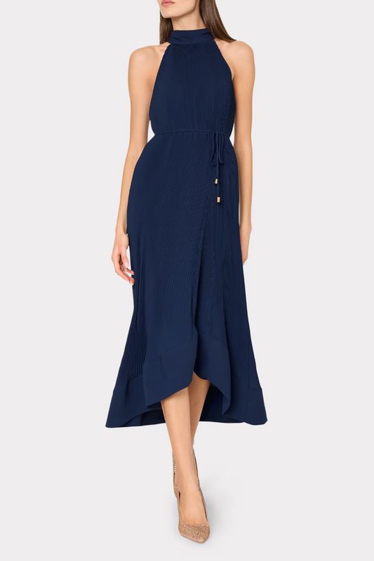 Navy blue dress worn by a model on a white background