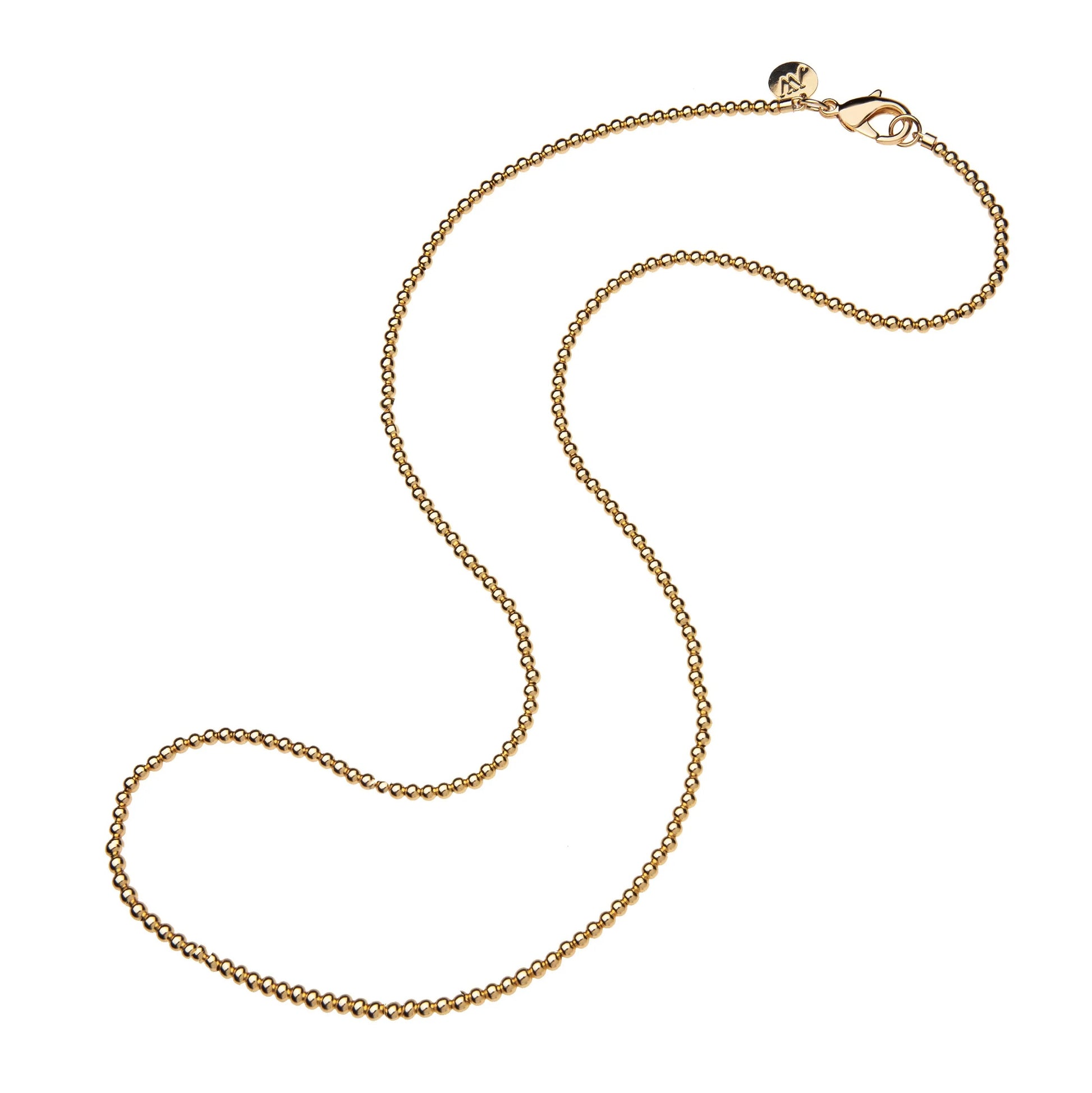Gold chain necklace on a white background