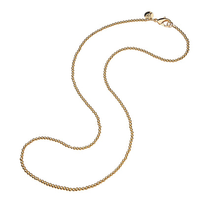 Gold chain necklace on a white background