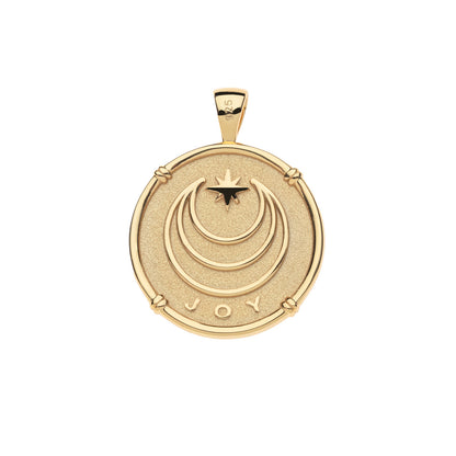 Gold pendant with 'JOY' engraving on a white background