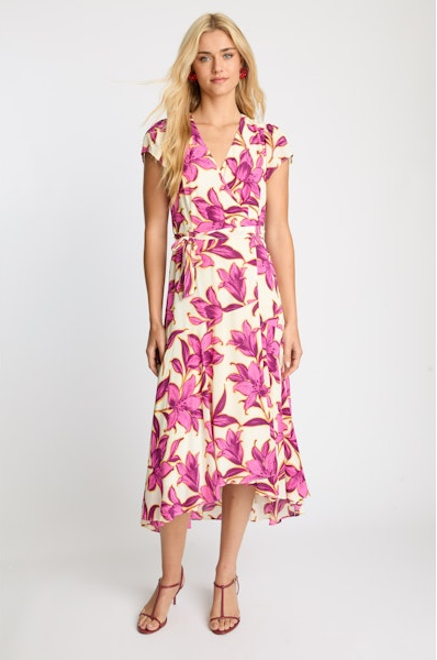 Woman wearing a floral dress on a white background