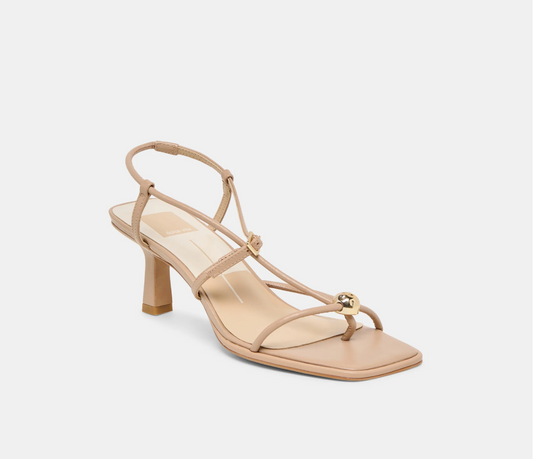 Beige sandal with thin straps on a white background